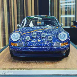 /img/51909-timothy-pierre-diecast-packaging.webp